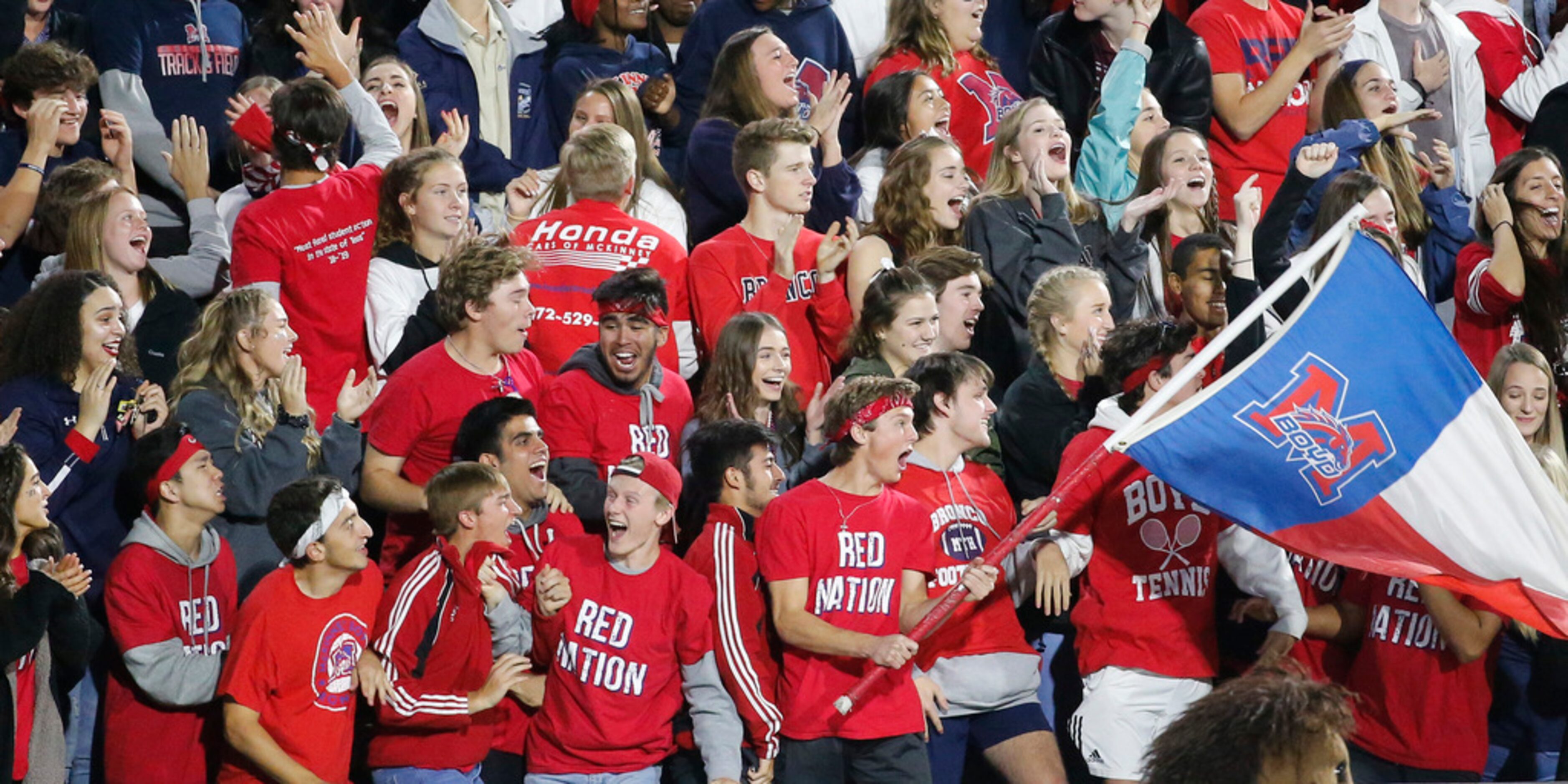 The McKinney Boyd students react to a Broncos touchdown pass in the second quarter during...