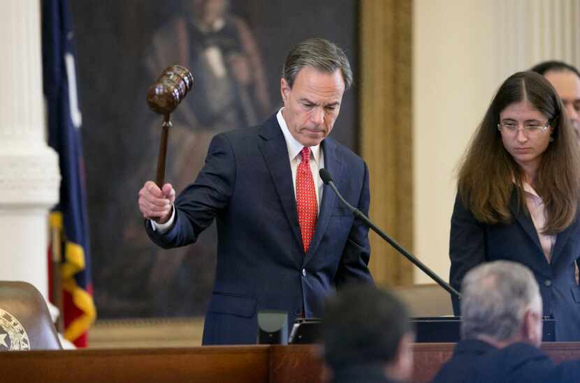 House Speaker Joe Straus compared Gov. Greg Abbott's special session agenda to a pile of...
