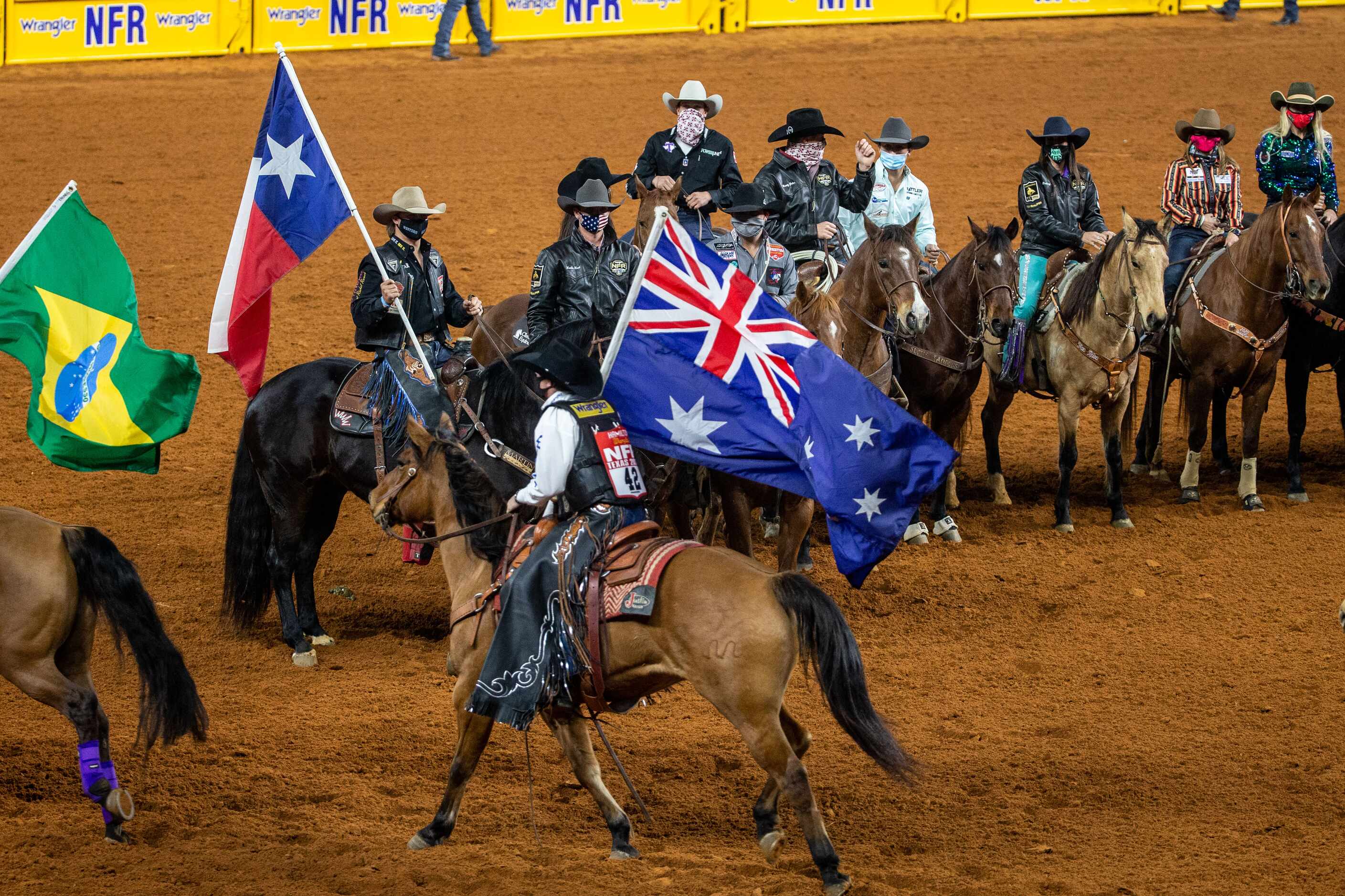 PRCA contestants from around the world gather during the opening night of the National...