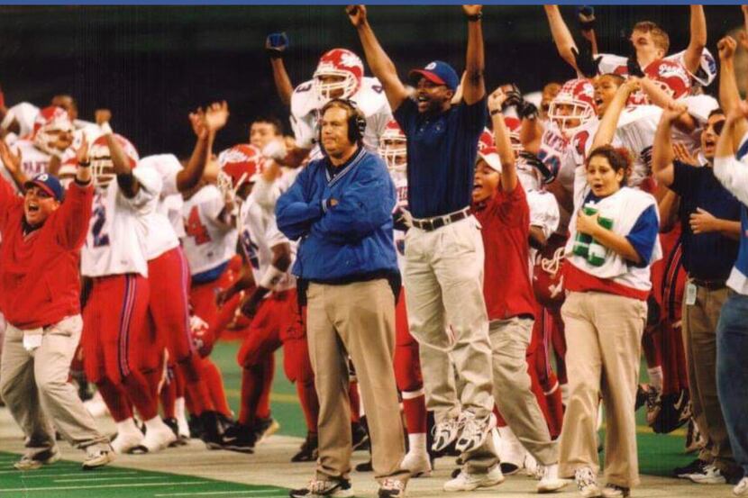 The Duncanville sideline celebrates as the Panther defense makes a key stop during the 1998...