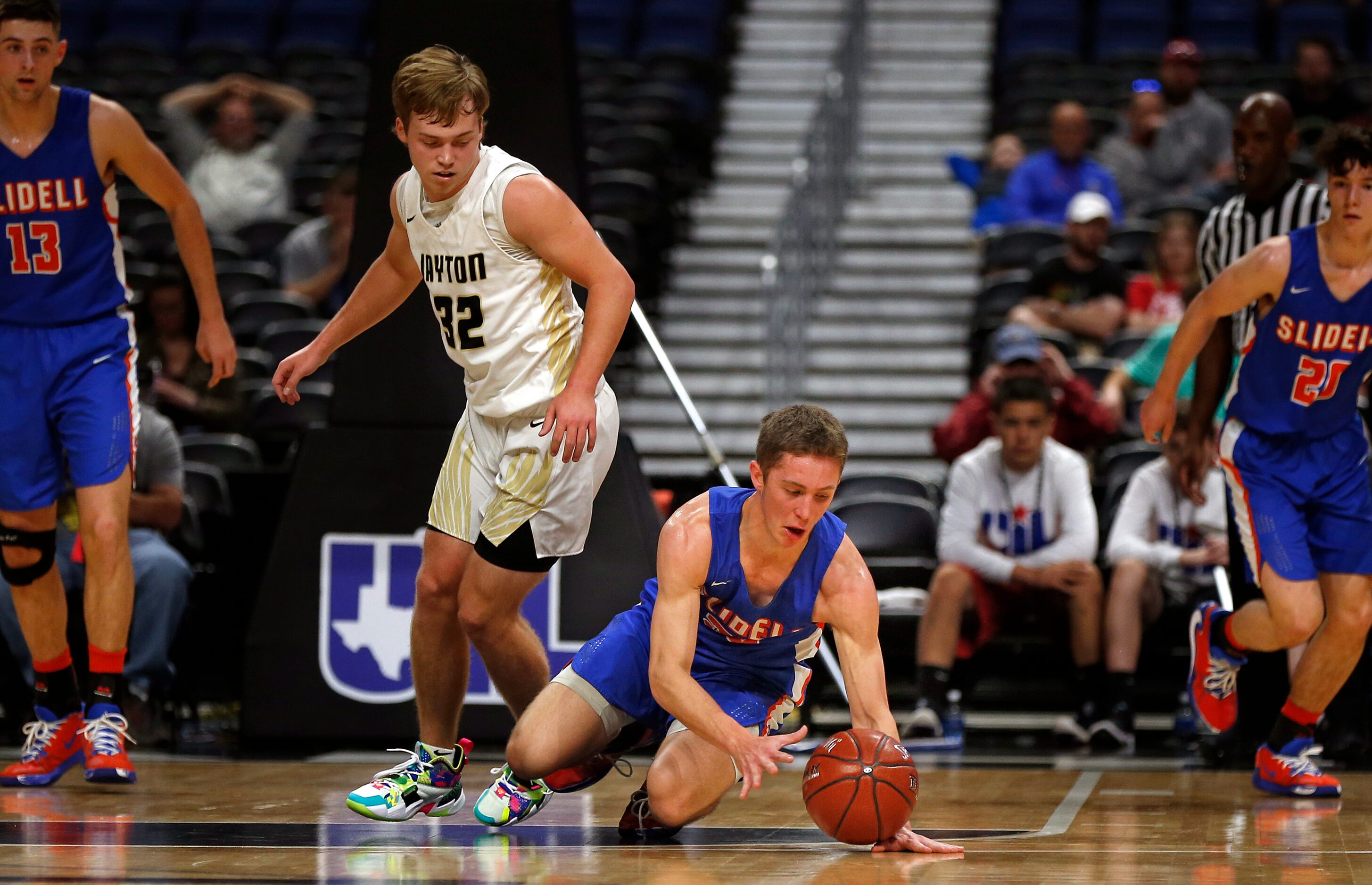 Slidell guard Easton Vanover #23 steals the ball from Jayton guard Tye Scogin #32.  Slidell...