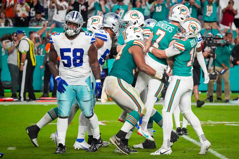 Dallas Cowboys defensive tackle Mazi Smith (58) walks away as Miami Dolphins place kicker...