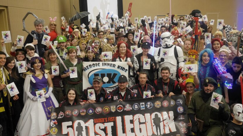 Cosplayers pose for a group photo at the Dallas Comic Con Fan Days 2015 Costume Contest at...