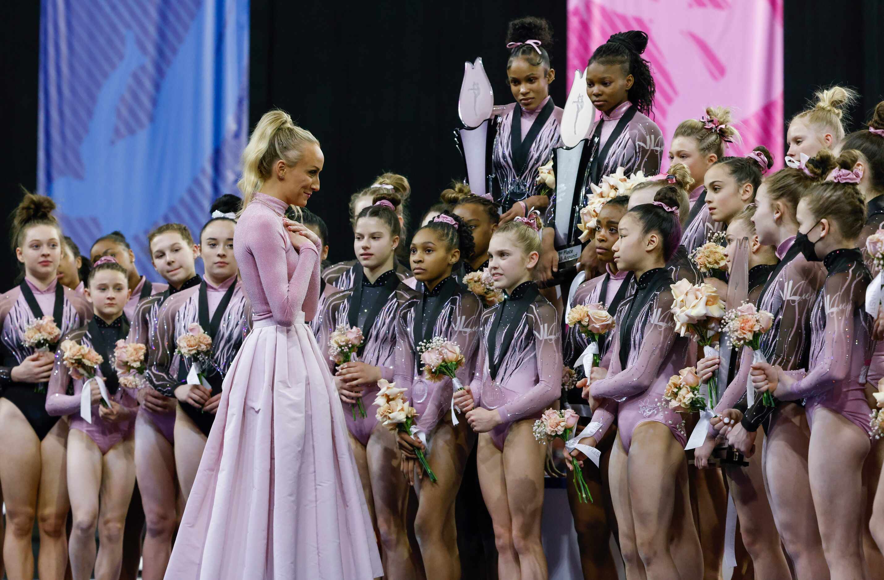 2008 Olympic All-Around champion and  five-time Olympic medalist Nastia Liukin, left,...