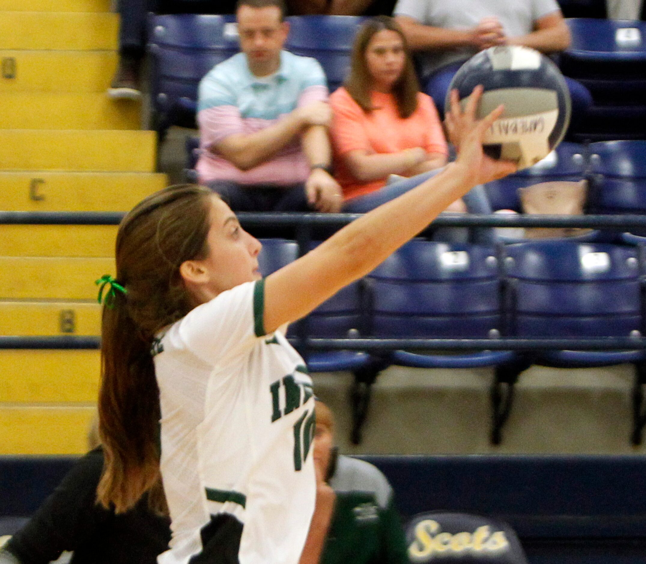 Waxahachie's Rylee Robinson (10) returns the ball during the 3rd set of their match against...