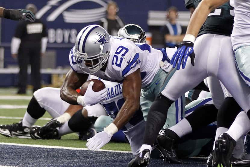 Dallas Cowboys running back DeMarco Murray (29) scores a touchdown in a game against the...