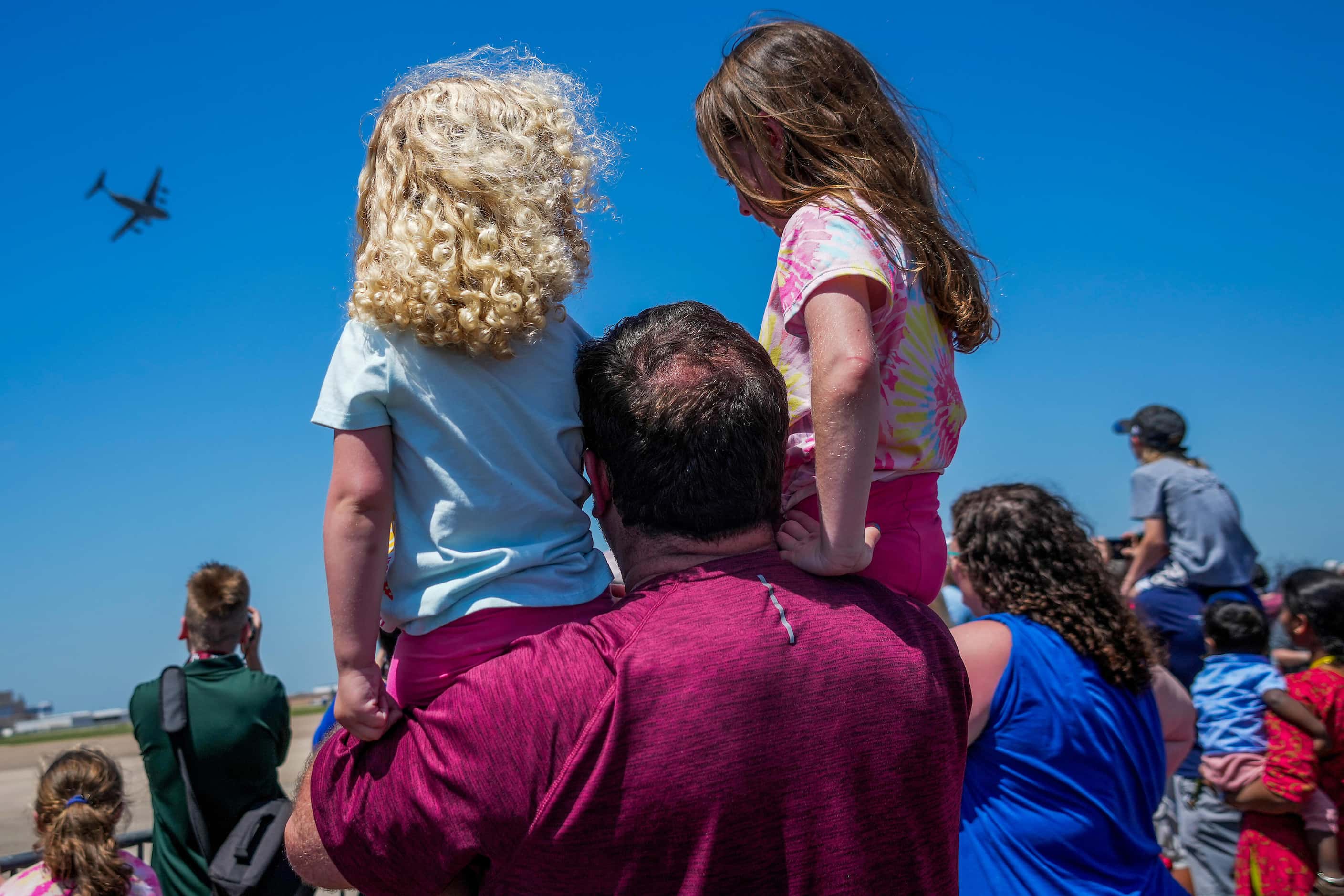 Spectators watch a C-17 demonstration at the Wings Over Cowtown Airshow on Sunday, April 14,...