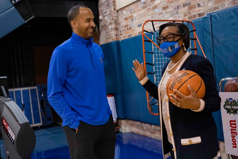 Dallas Mavericks GM Nico Harrison (left) chats with Mavericks CEO Cynt Marshall on Tuesday,...