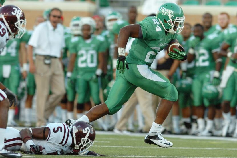 University of North Texas junior running back Brandin Byrd (24) escapes from Texas Southern...