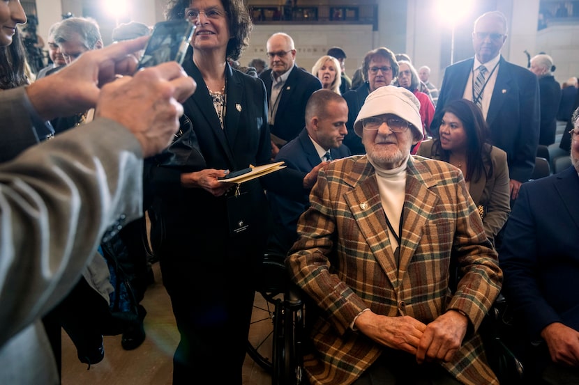 Ghost Army member Bernard Bluestein of Hoffman Estates, Ill., talks with well-wishers after...