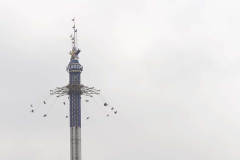 Visitors to Six Flags Over Texas take a whirl on the Texas SkyScreamer. Guinness World...
