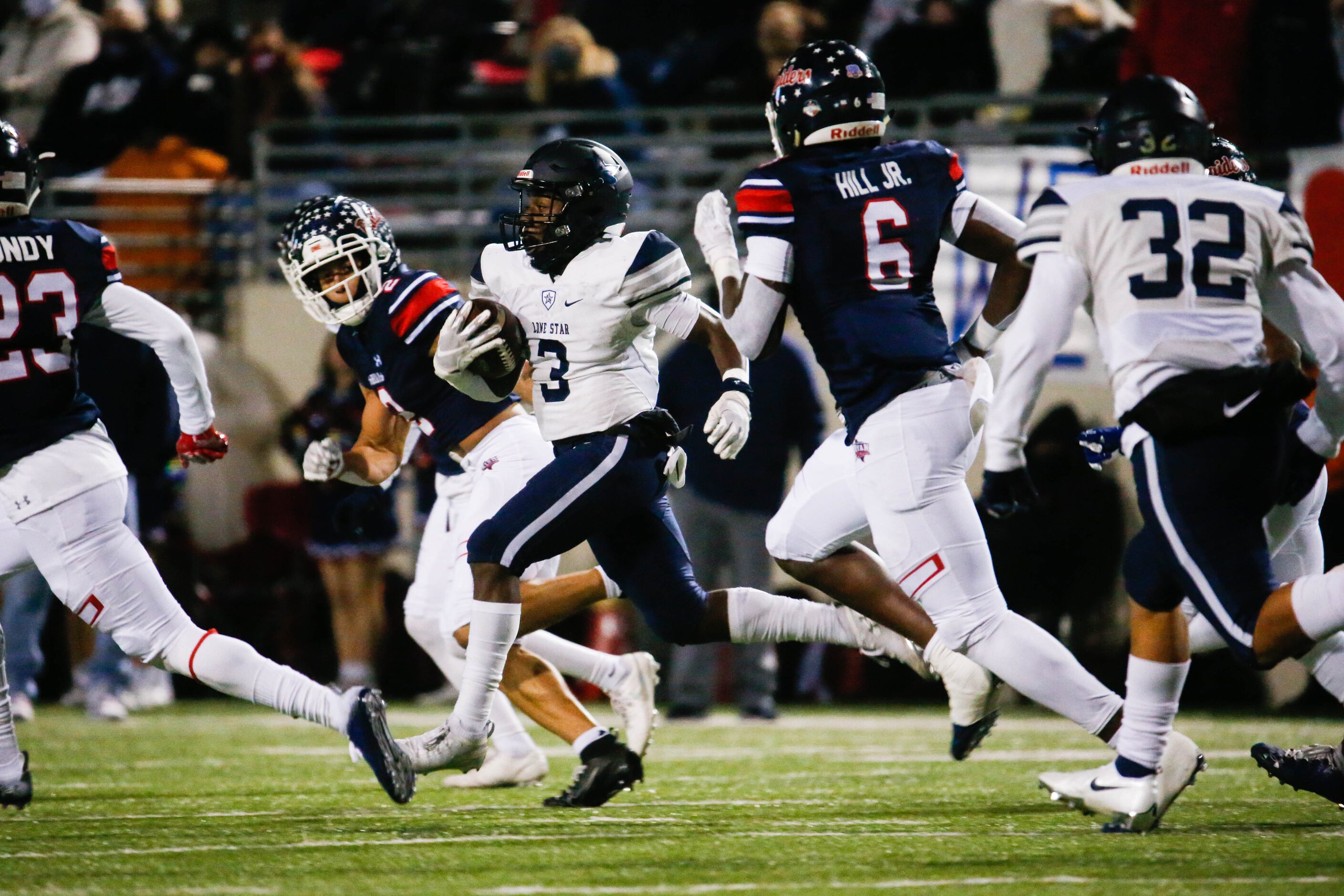 Frisco Lone Star's Tolu Sokoya (3) runs the ball during the first half of a football game...