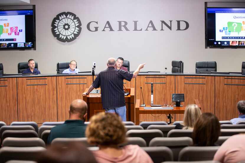 Mike Harbison, a Garland resident, speaks during an Environmental Protection Agency hosted...