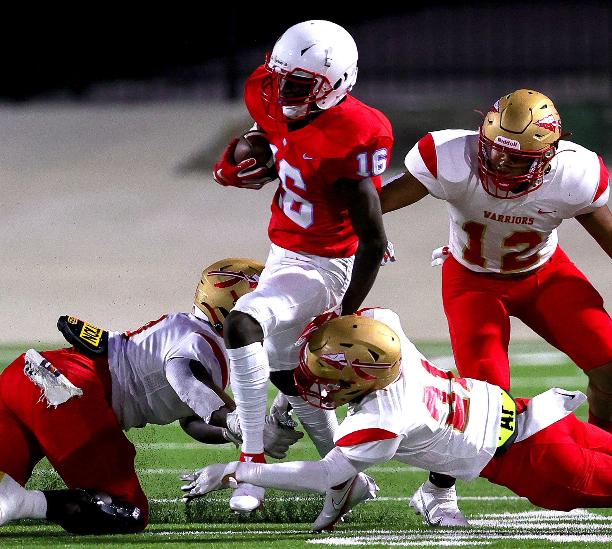 Skyline wide receiver Payton Ross (16) tries to break a tackle against South Grand Prairie...