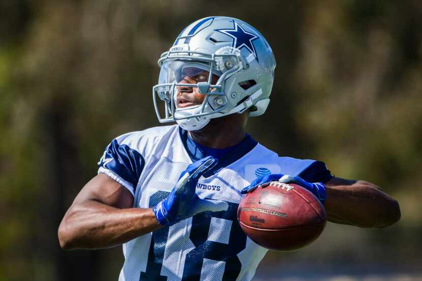 Dallas Cowboys wide receiver Randall Cobb (18) throws the ball during an afternoon practice...