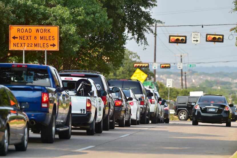 
Traffic along Post Oak Drive at the Interstate 35E service road is shown Thursday in...