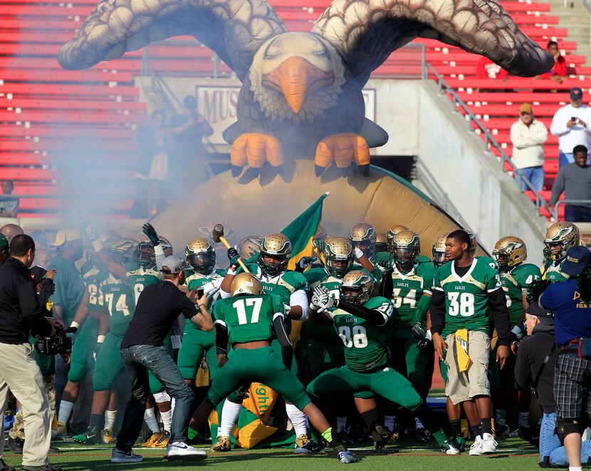 The DeSoto Eagles prepare to enter the field before the start of a UIL high school Class 5A...