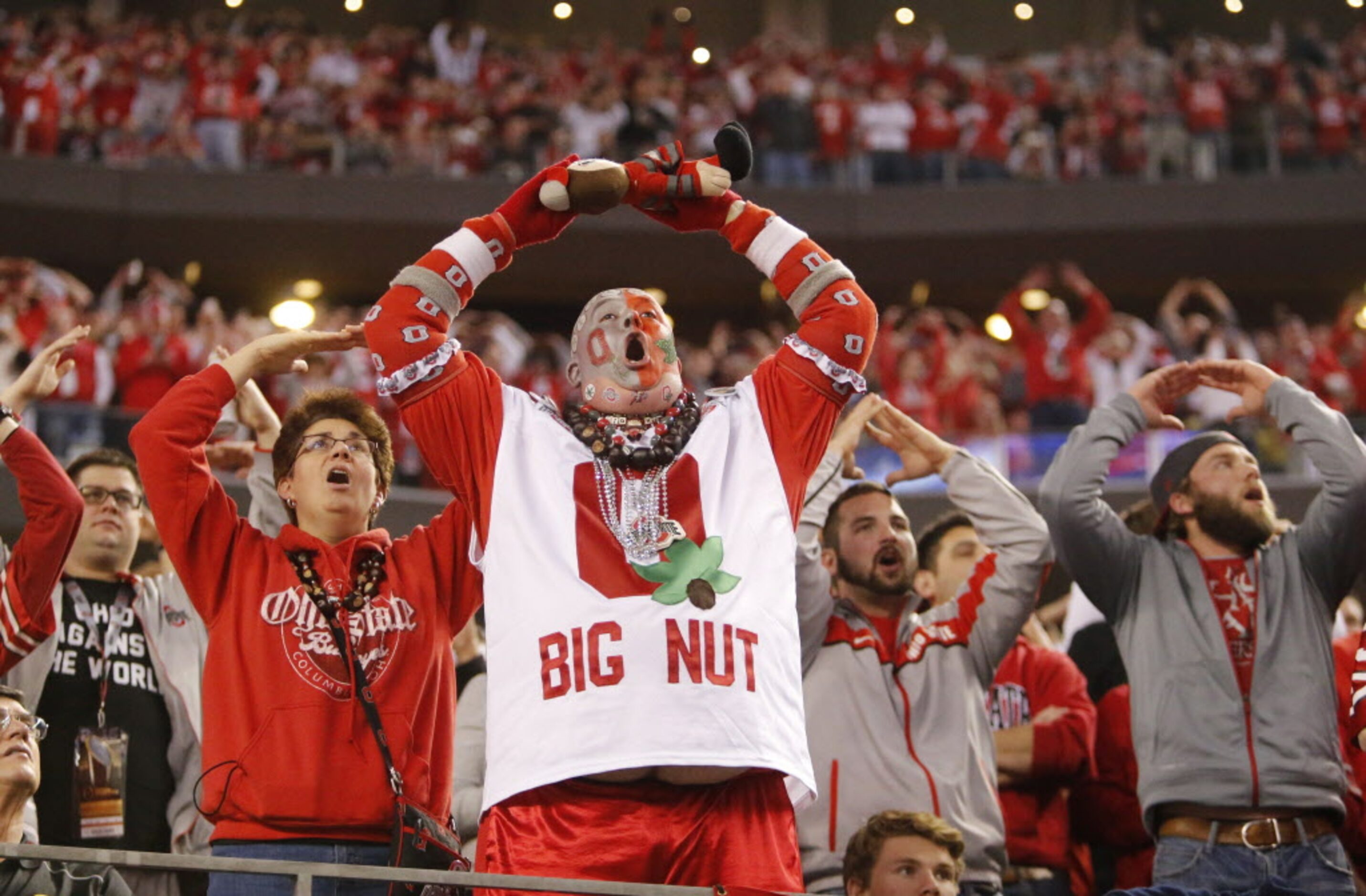 Ohio State Buckeye fans cheer during the College Football National Championship Game between...