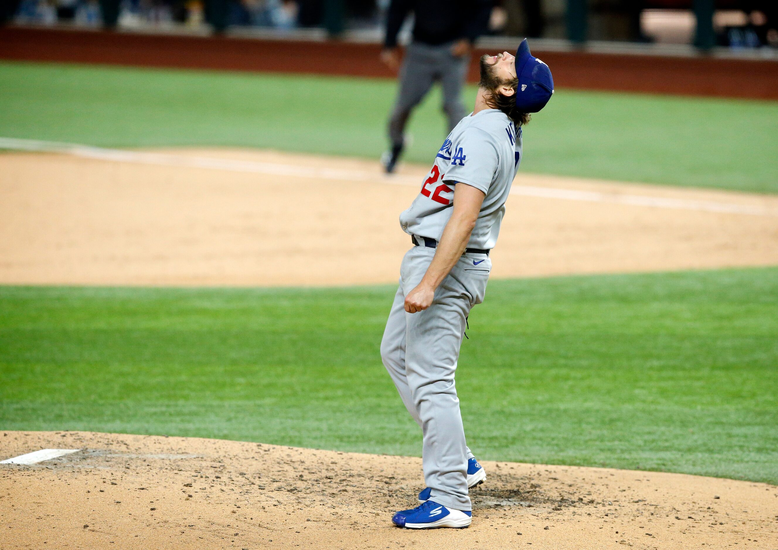 Los Angeles Dodgers starting pitcher Clayton Kershaw (22) reacts after Atlanta Braves...