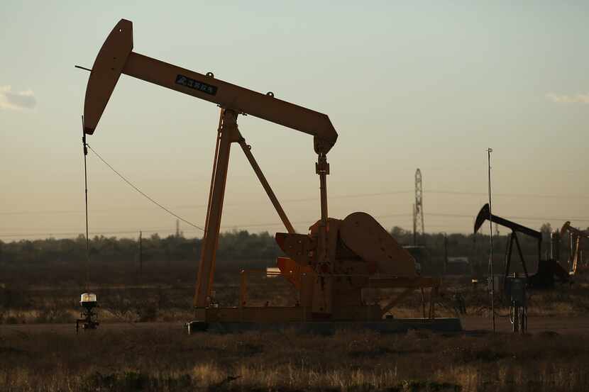 A pumpjack sits on the outskirts of town  in the Permian Basin oil field on January 21,...