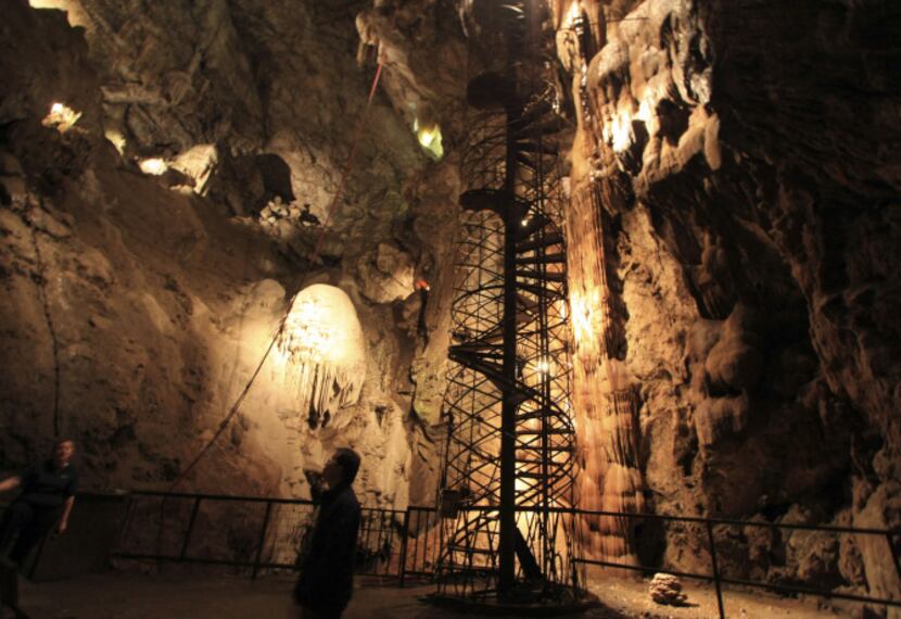 Brave tourists can go rappelling, caving, ziplining and climbing inside Moaning Caverns near...