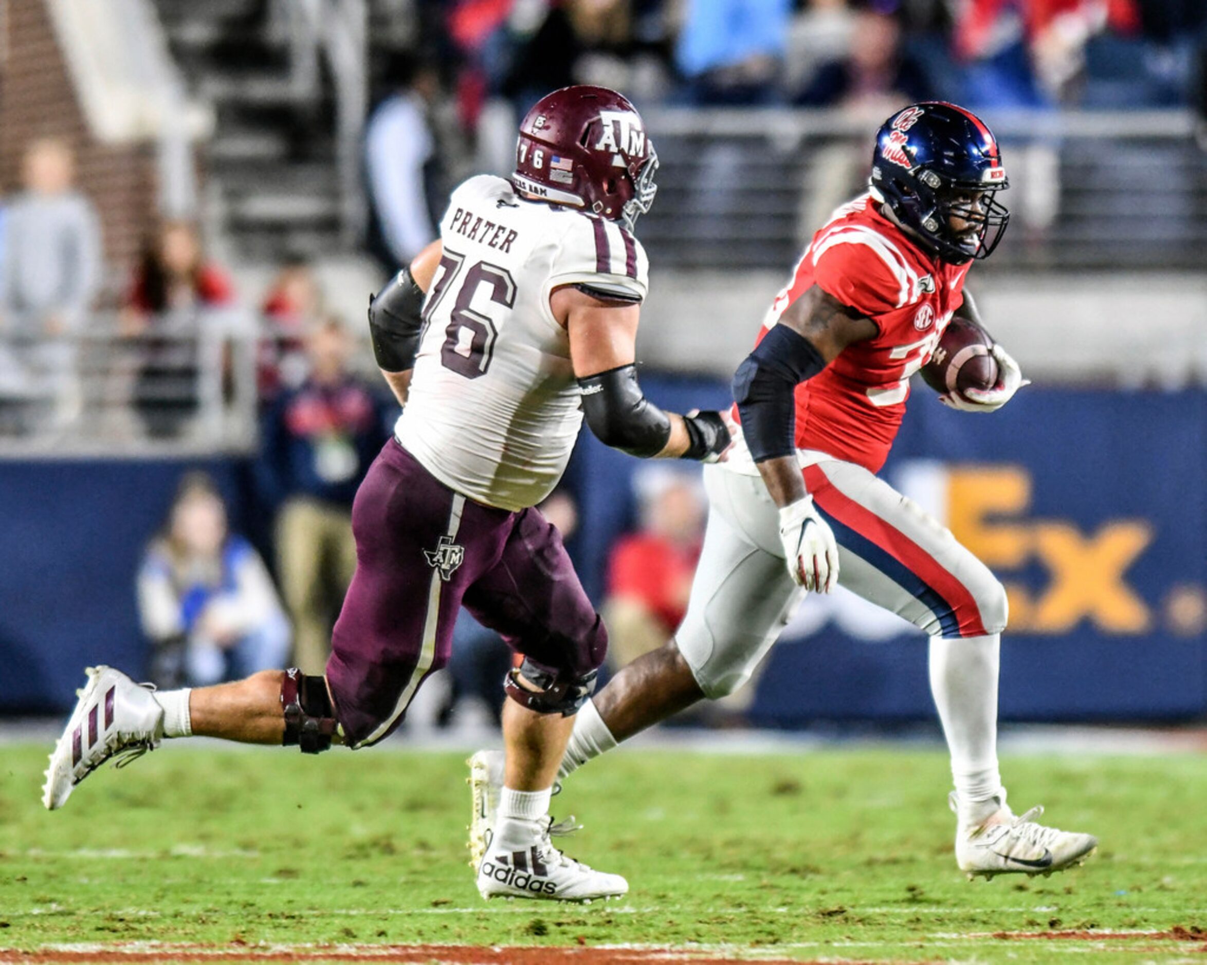 Mississippi defensive end Austrian Robinson (38) intercepts a pass as he is chased by Texas...