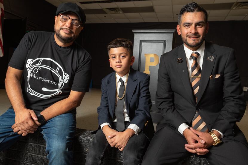 L-R: Mauricio Montoya, of Apollo Films, fourth grader Levi Espinoza and Principal Tito...