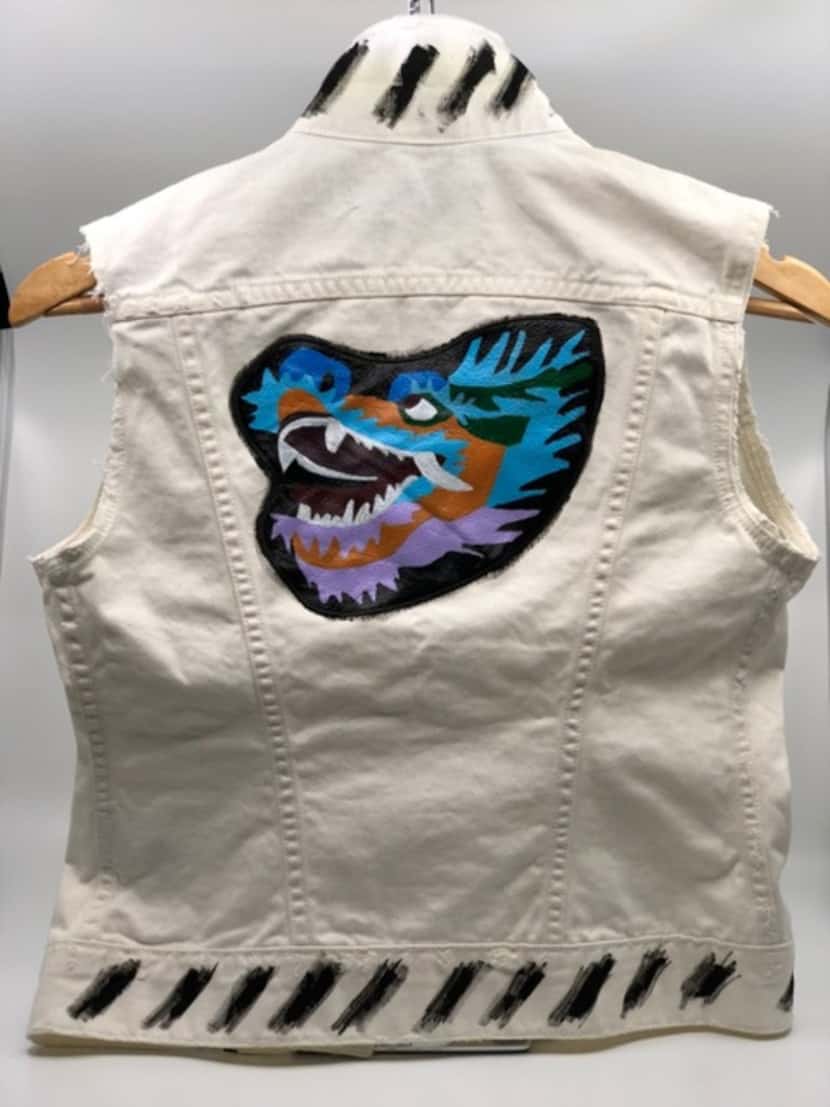 Stephanie Quadri had KCA Design paint a dragon on her denim vest in honor of her son.