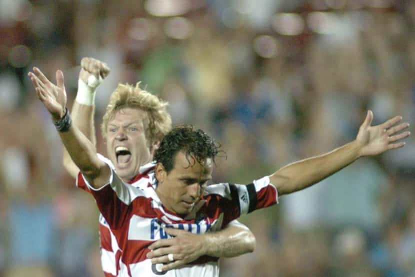 Two of the club's most iconic players, Pareja celebrates his final goal scored for FC Dallas...