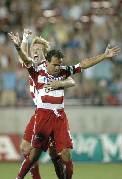 Two of the club's most iconic players, Pareja celebrates his final goal scored for FC Dallas...