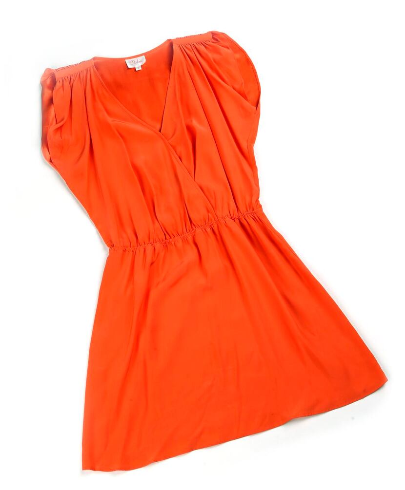 

Simple and bright: This silk Parker dress does double duty as a standalone piece or a...