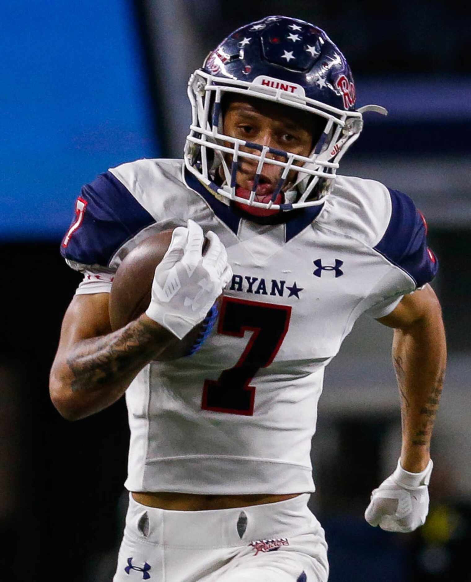 Denton Ryan's Tra Smith (7) runs in a touchdown in the first quarter of a Class 5A Division...
