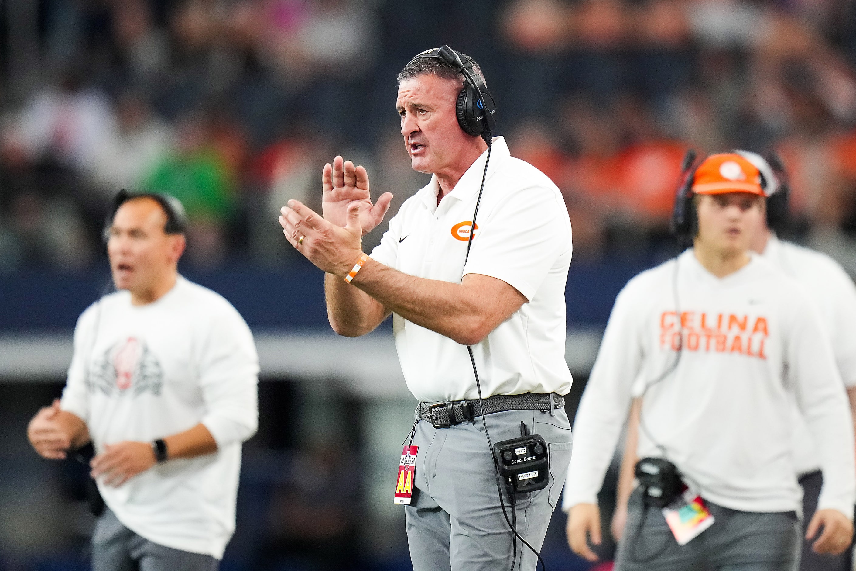 Celina head coach Bill Elliott applauds a play during the Class 4A Division I state football...