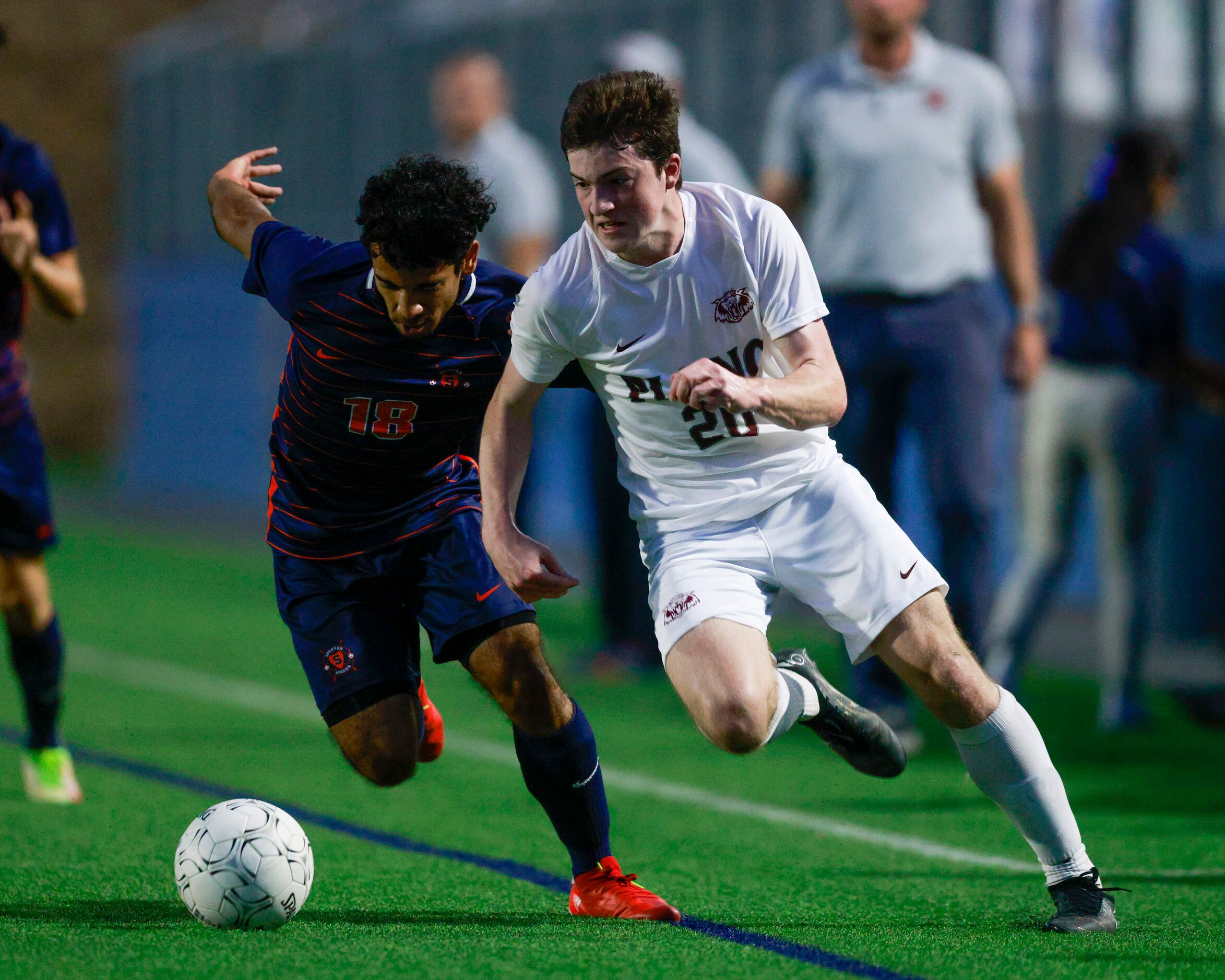 Plano midfielder Ethan Steele (20) dribbles around Katy Seven Lakes defender Ved Maharaj...