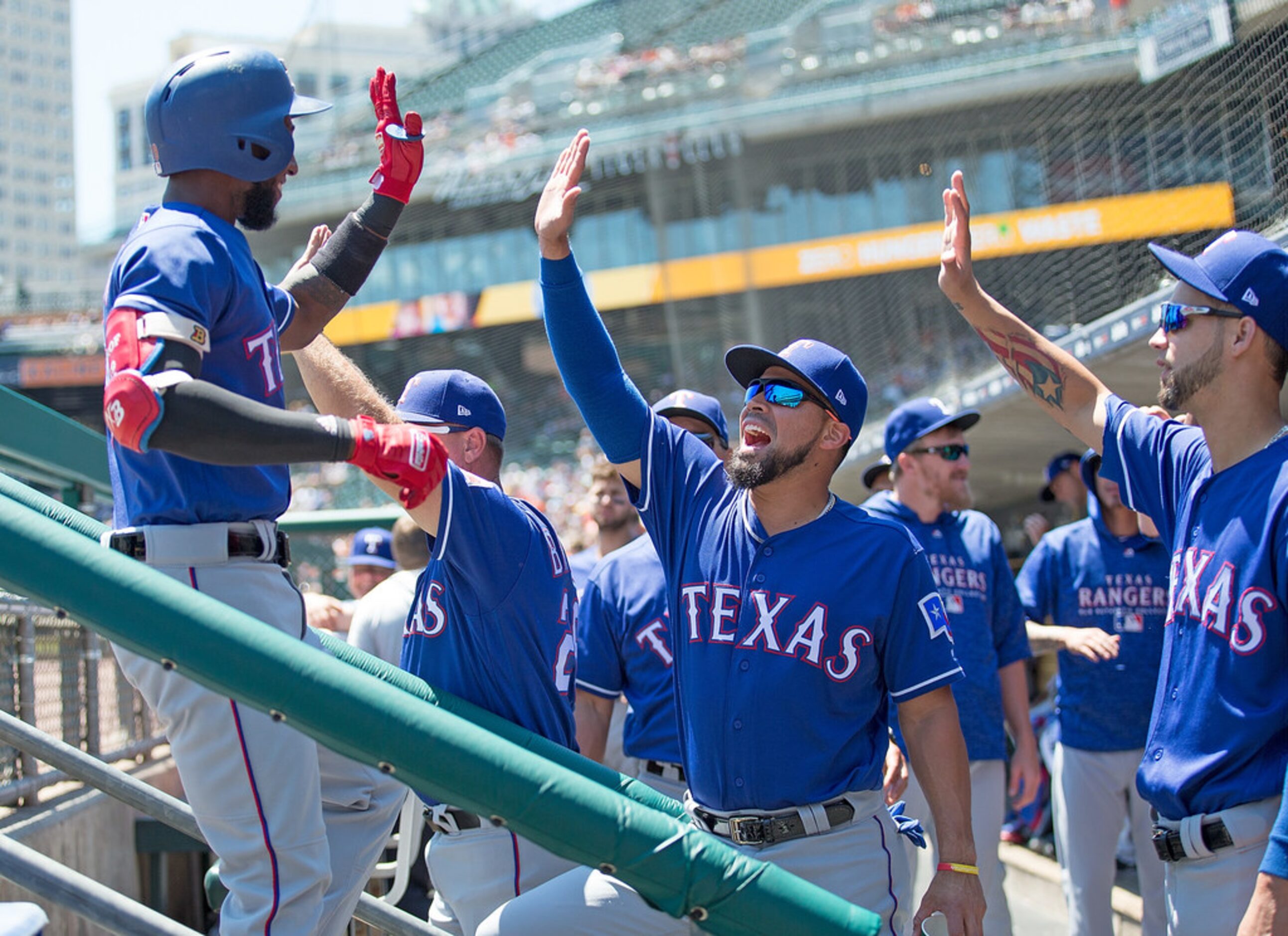 DETROIT, MI - JULY 8: Jurickson Profar #19 (left)  of the Texas Rangers celebrates a first...