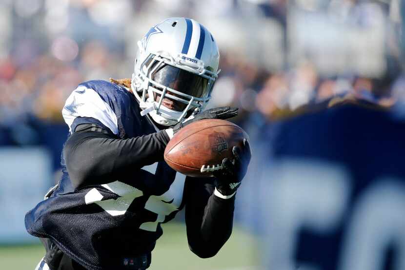 Dallas Cowboys outside linebacker Jaylon Smith (54) catches the ball in a drill during...