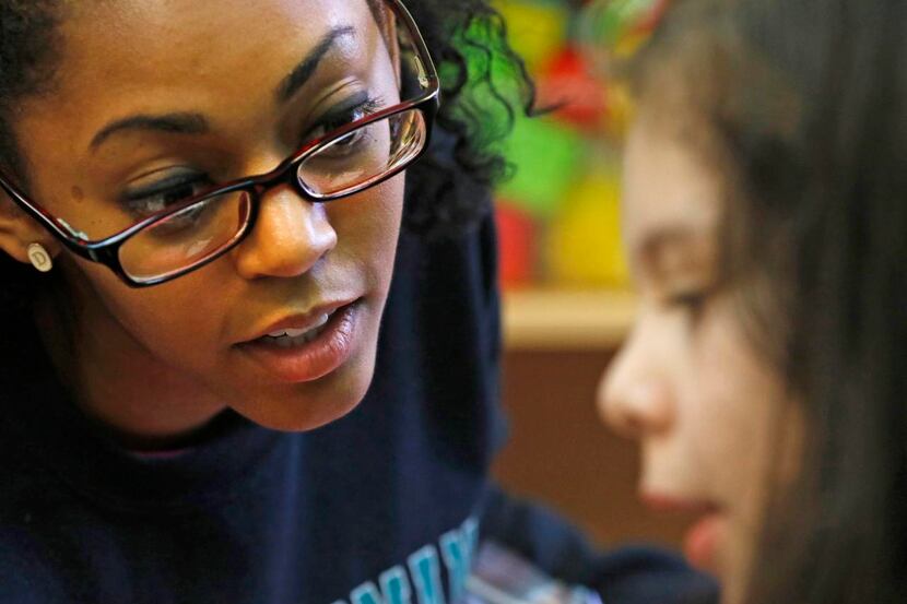 
Sydnyy Mosby works with Ave Arreola, 5, at Metrocare’s autism treatment center in Dallas....
