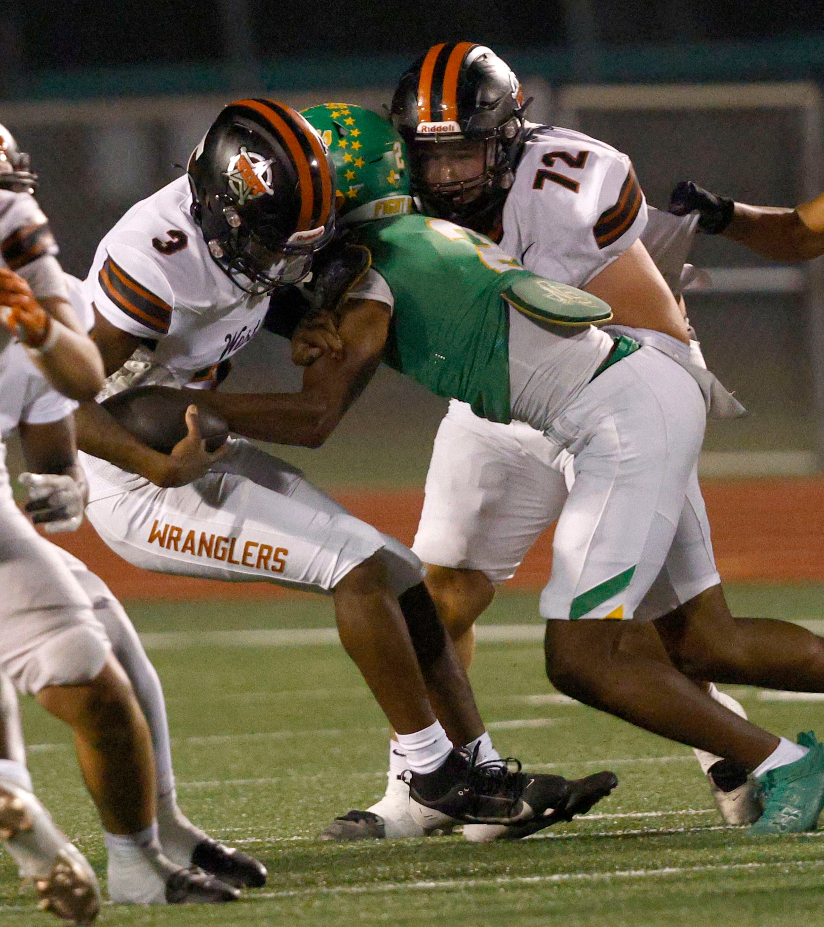 West Mesquite's quarterback Demetris Ballard (3) is sacked by Newman Smith's Braylon Avery...