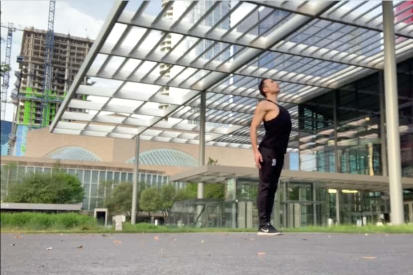 Bruce Wood Dance company member Cole Vernon performing "Imagine" in front of Winspear Opera...