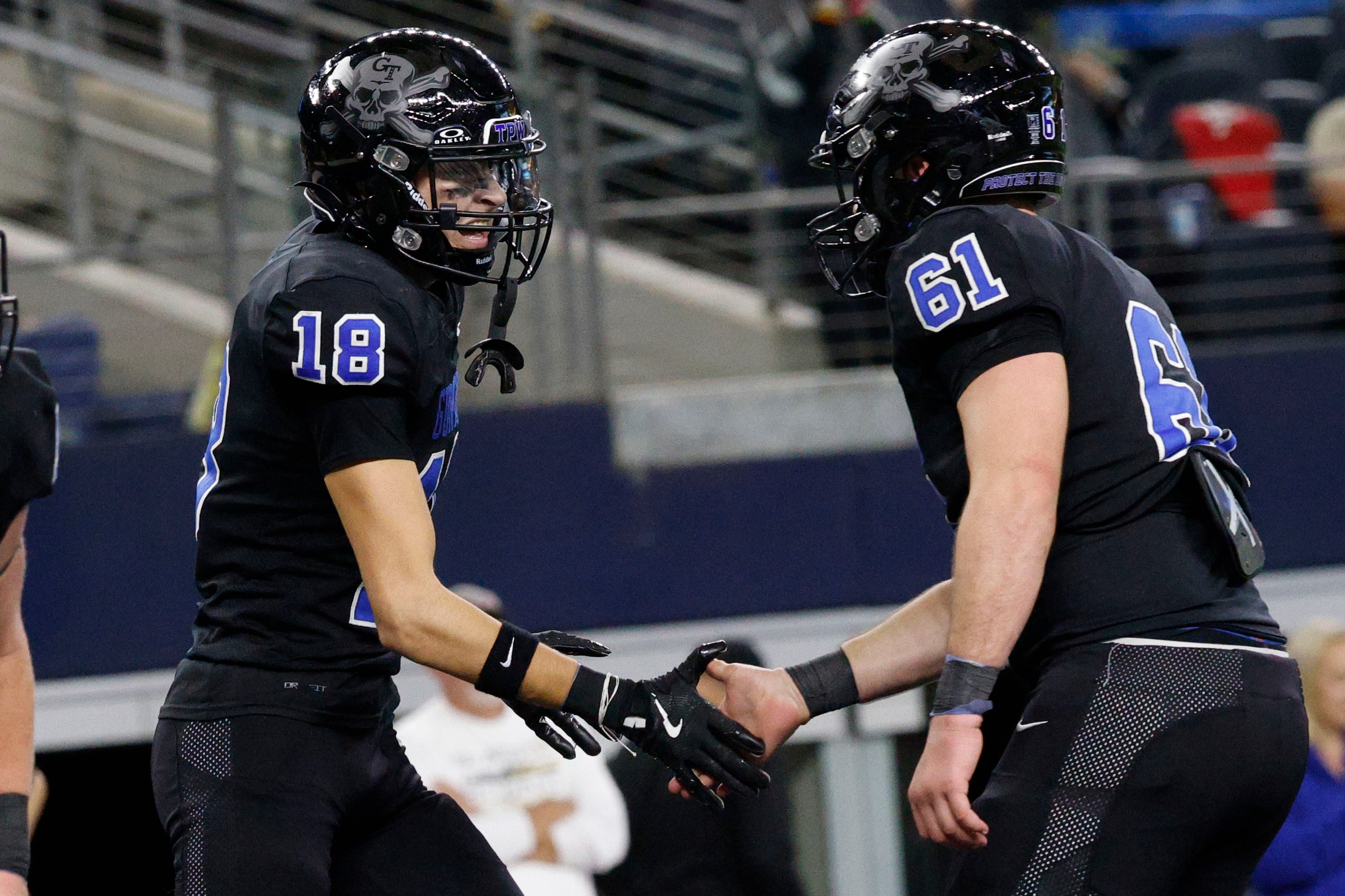 Gunter's  Cash Rumage (18) celebrates with his teammate Garrin Goetz (61) after scoring a...