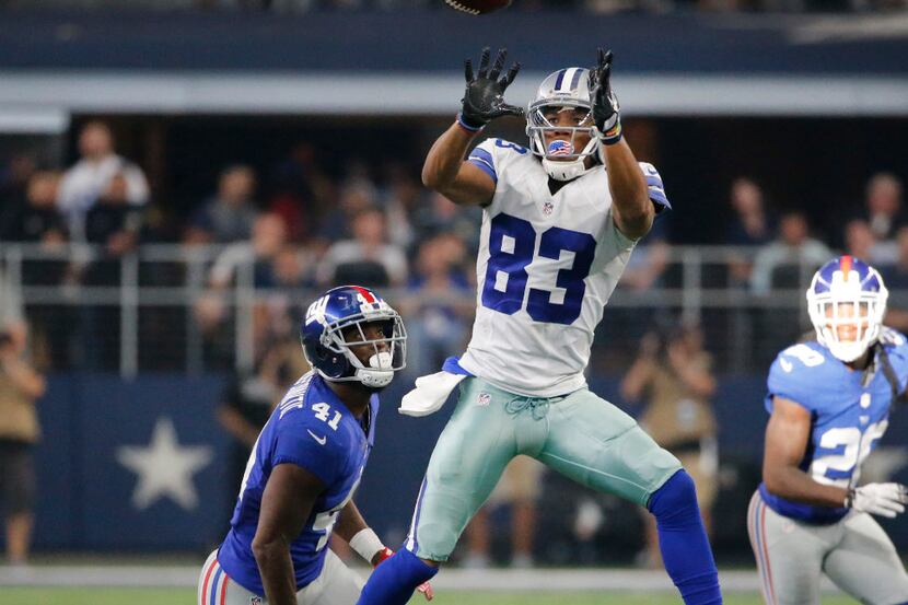 Dallas Cowboys wide receiver Terrance Williams (83) catches a fourth-quarter pass during the...