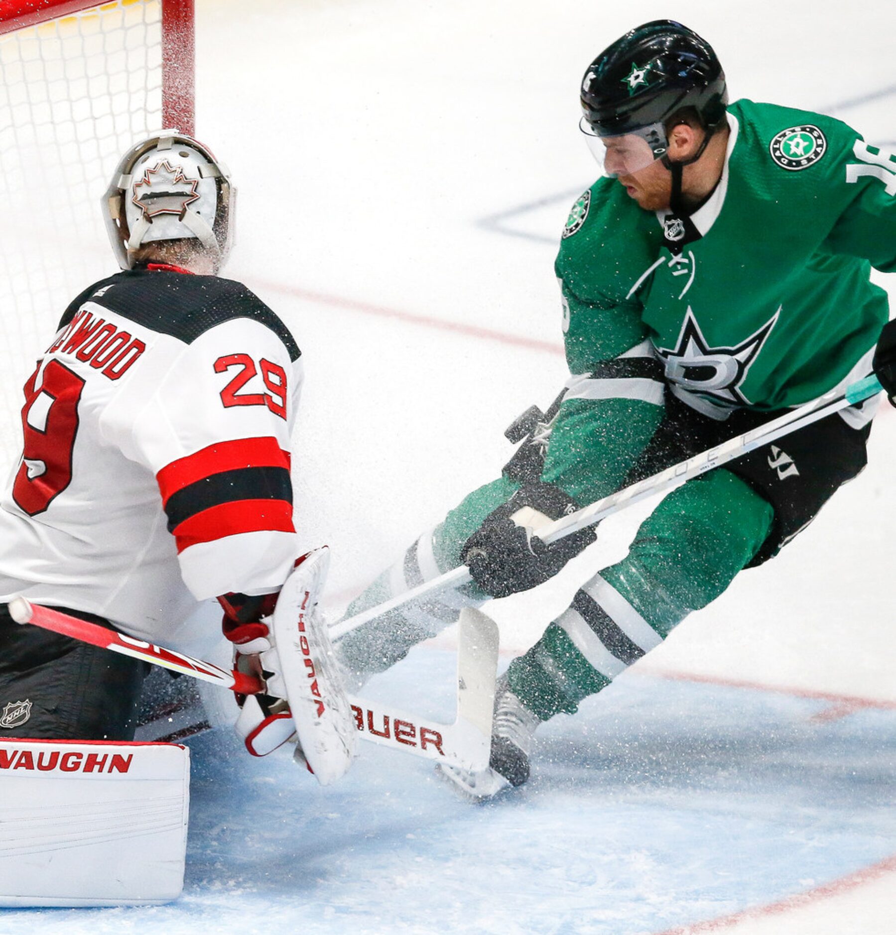 Dallas Stars center Joe Pavelski (16) attempts a shot on New Jersey Devils goaltender...