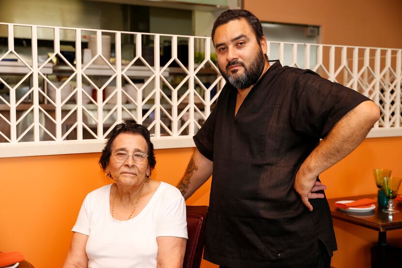 Chef Gino Rojas and his mother, Juanita Rojas, at Revolver Taco Lounge in Fort Worth. 