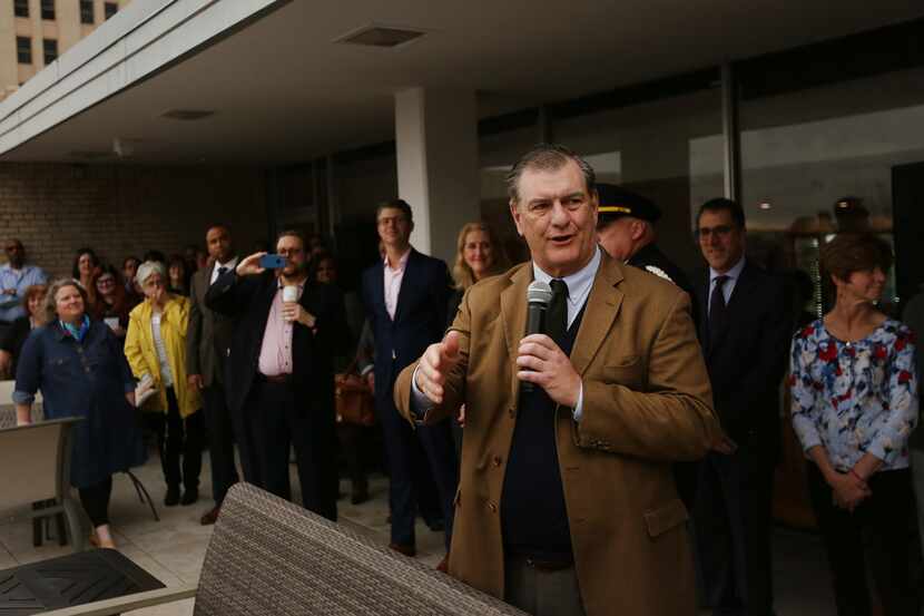 Dallas mayor Mike Rawlings makes comments before reciting the Pledge of Allegiance after the...