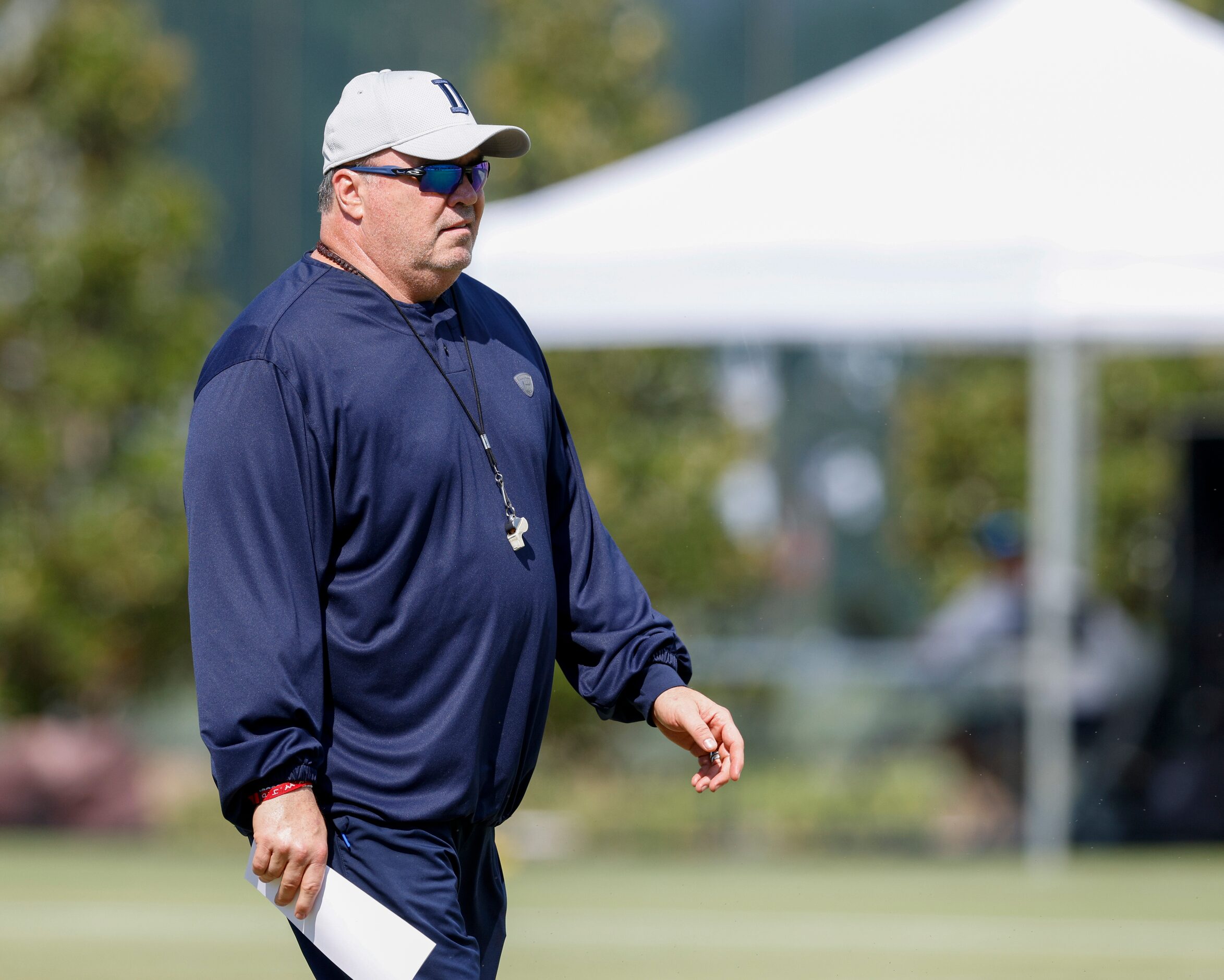 Dallas Cowboys head coach Mike McCarthy walks the field during a practice at The Star,...