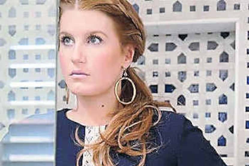  Amber Venz in a Koch tunic (www.shopkoch.com) and earrings of her own design...