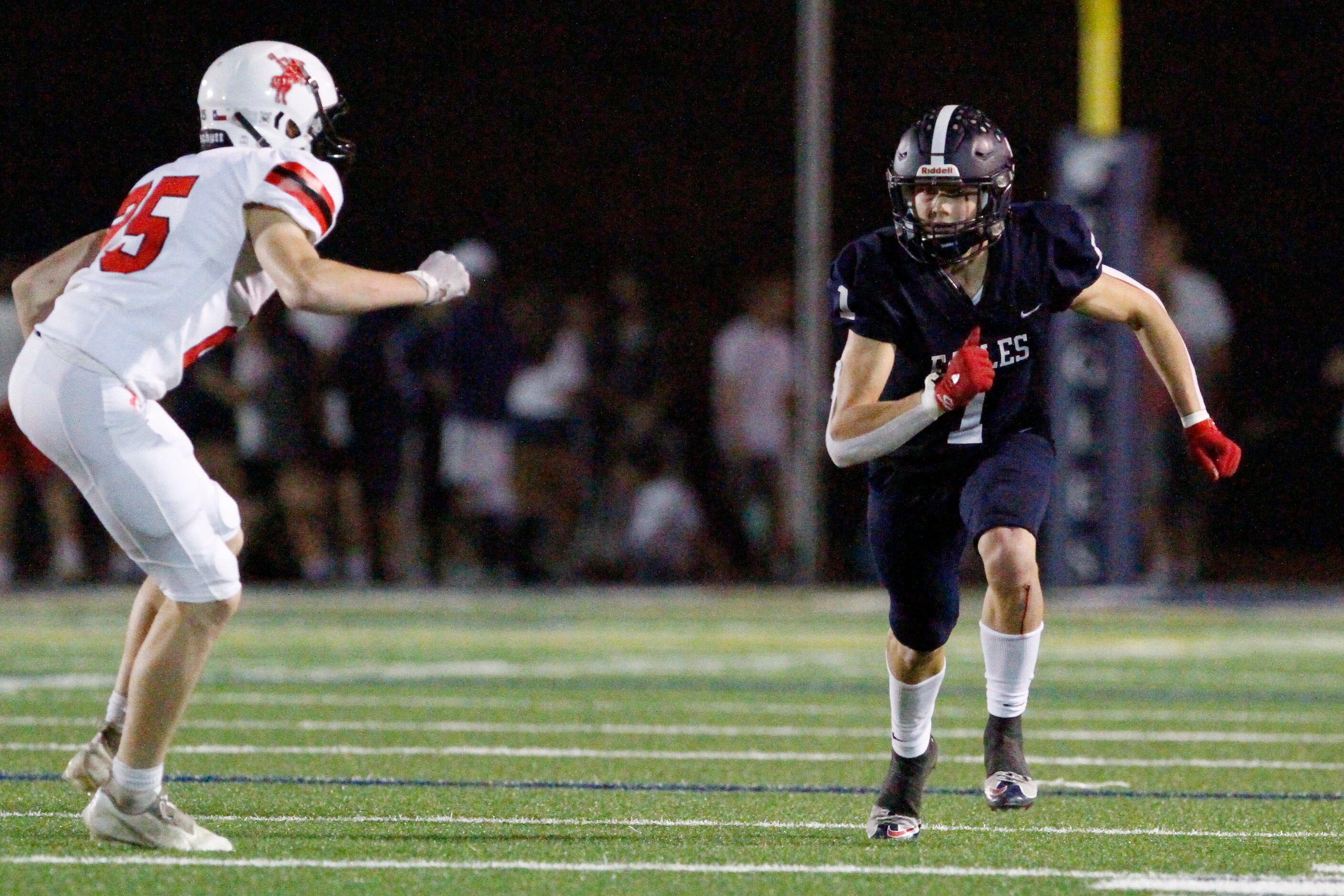 Episcopal School of Dallas junior wide receiver Blair Brennan (1) runs a route while...