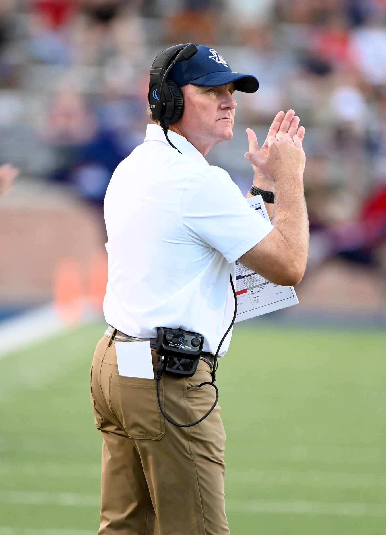 Allen head coach Chad Morris reacts to play in the first half during a high school football...