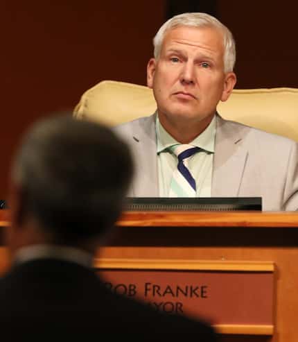 Cedar Hill Mayor Bob Franke listens during a City Council meeting in the town's government...