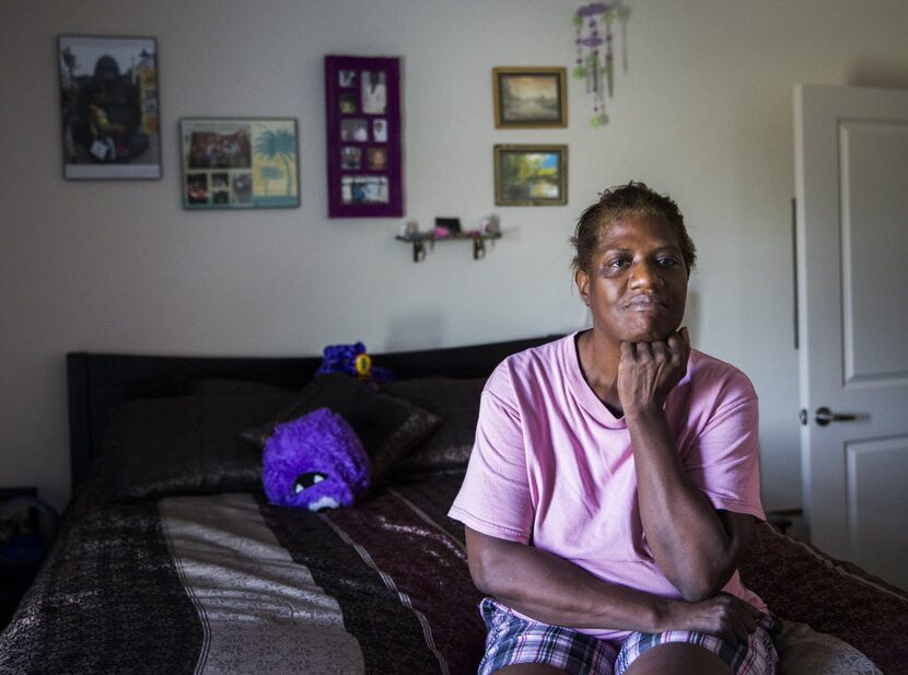 Debra Cavett poses for a portrait in her apartment on Tuesday, July 21, 2015 at Millennium...